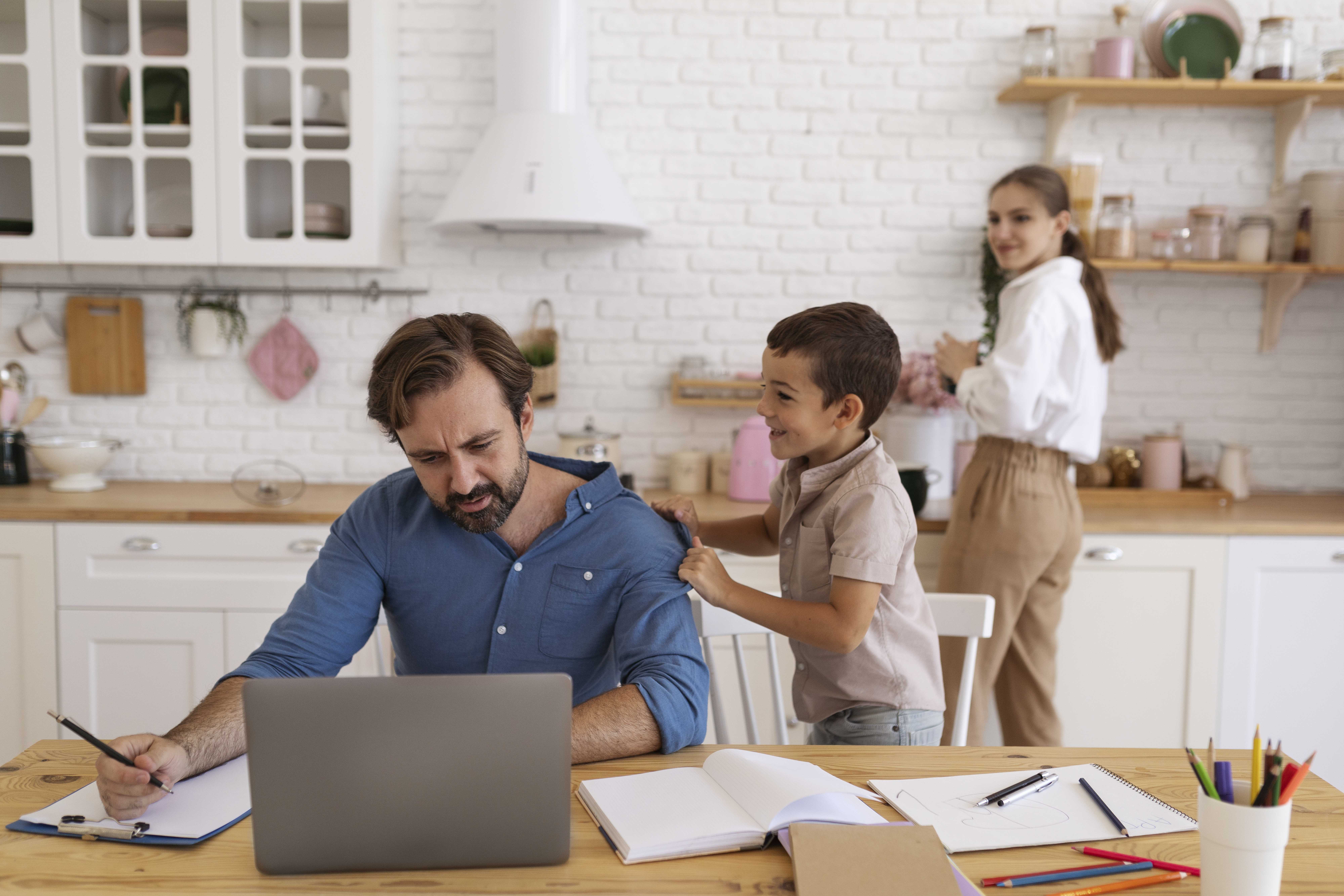 The image shows parents working around their kid.