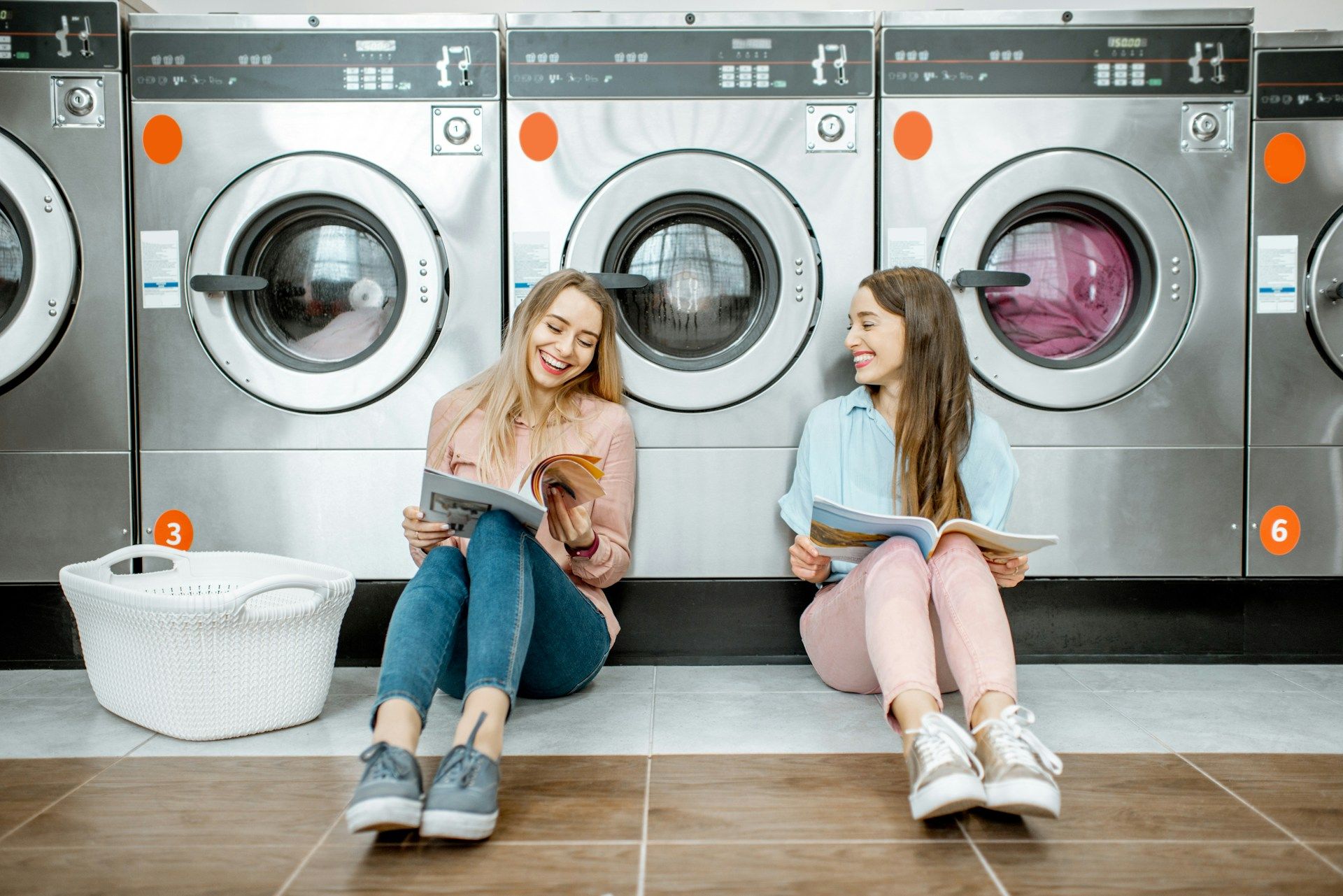 college students doing the laundry
