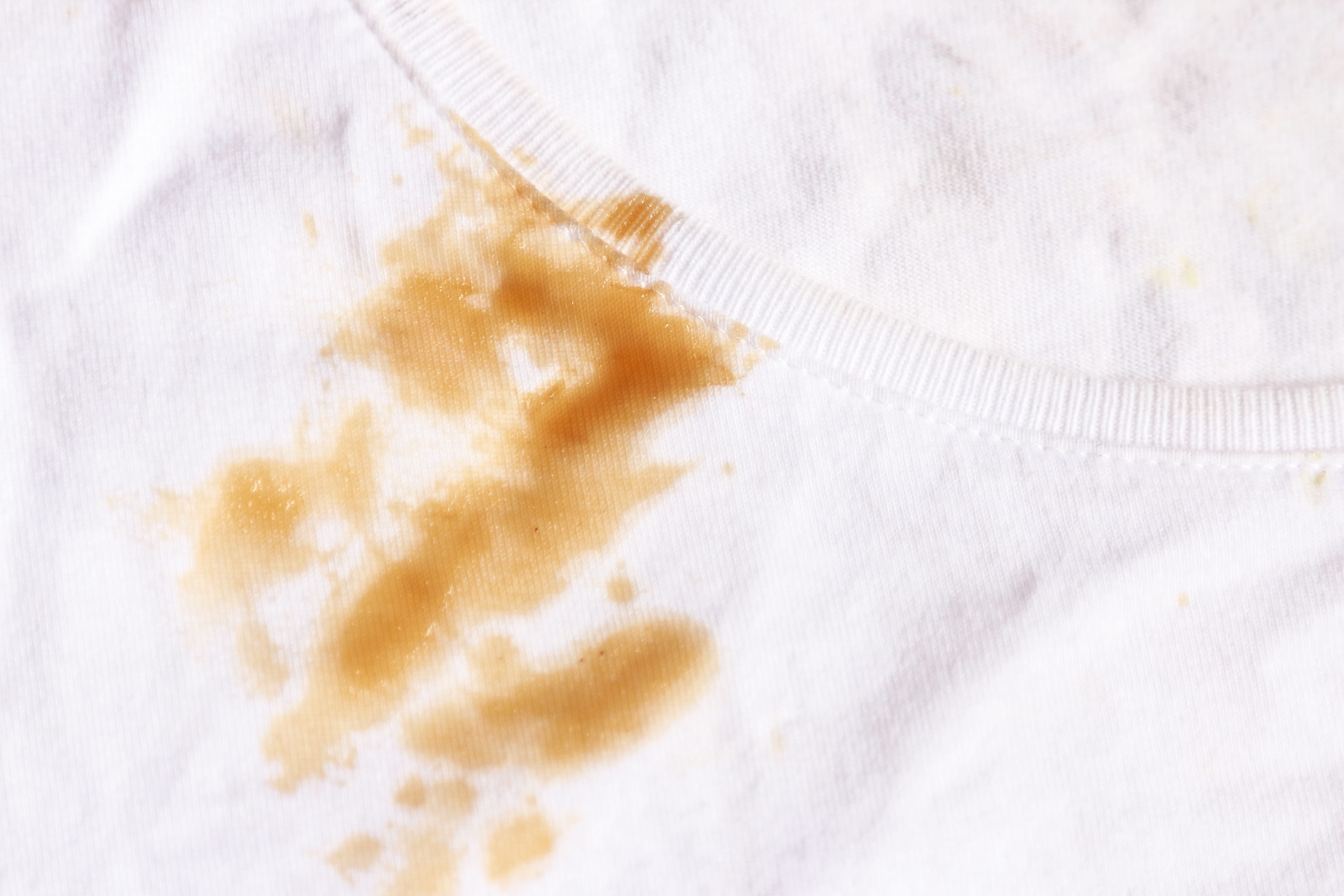 top view of stain on white shirt